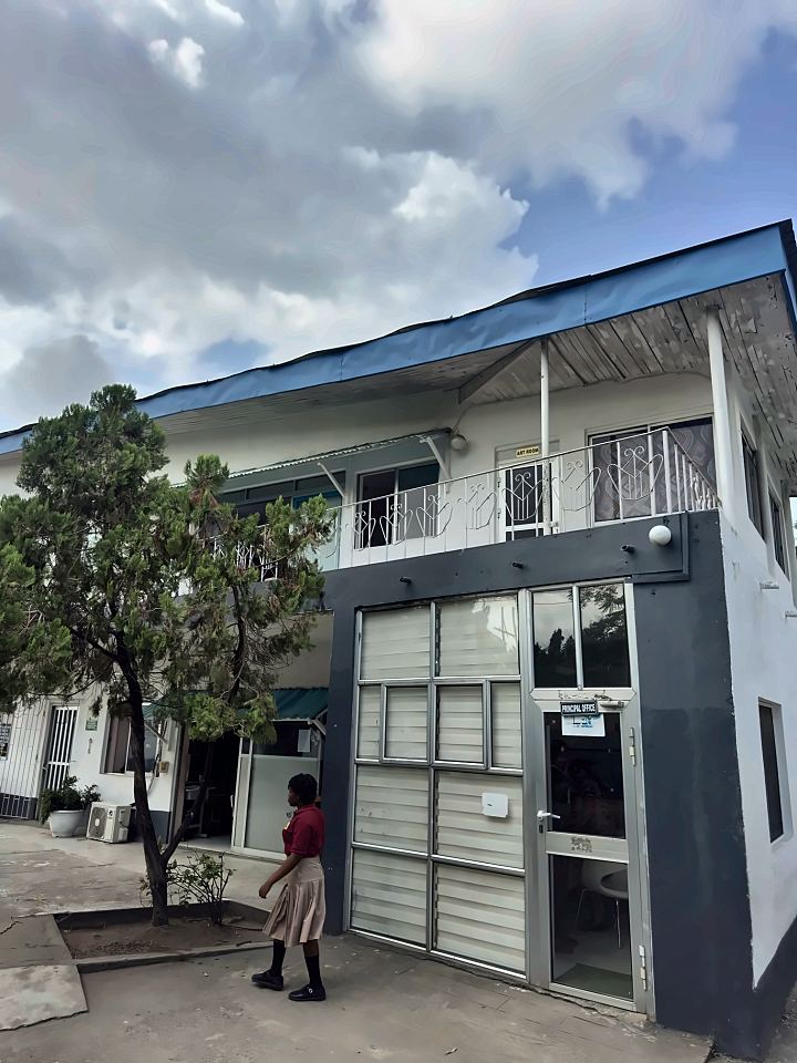 The principal's office with the art room on the floor above