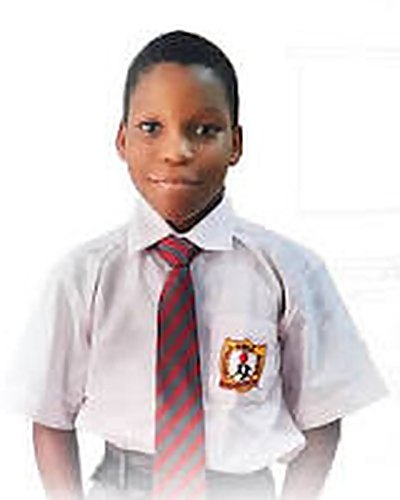 Samuel John, Knightdale Middle College student, in school uniform